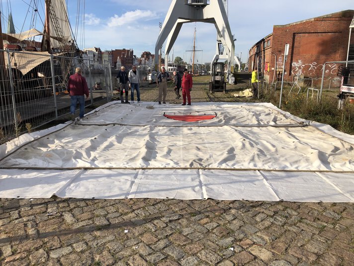 Ausbreiten_und_dann_Zusammenlegen